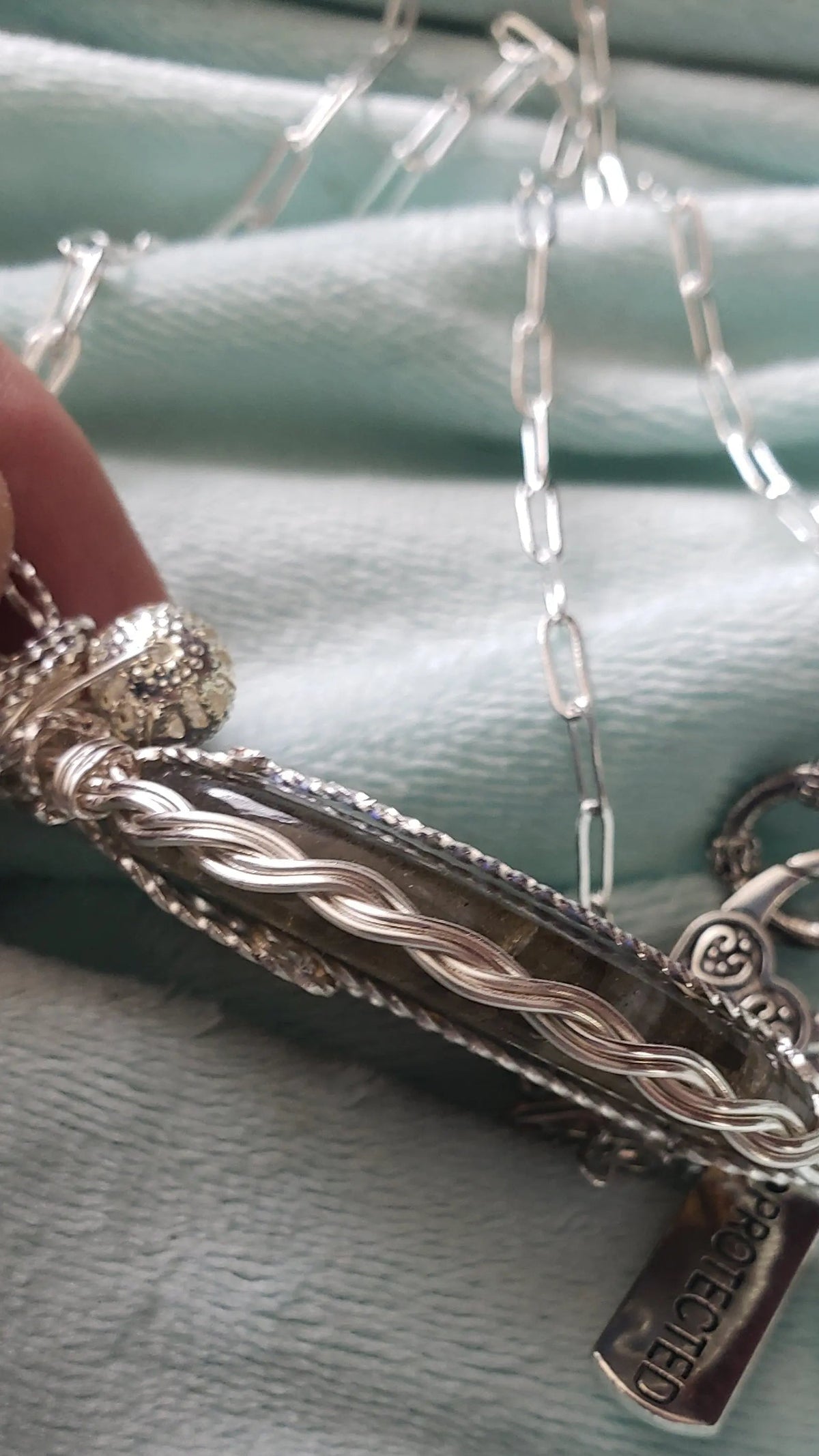 Handbraided celtic braid Silver bezel